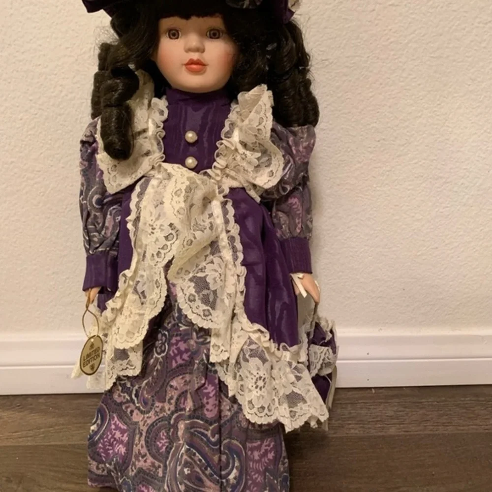 Elegant Purple and Cream Doll